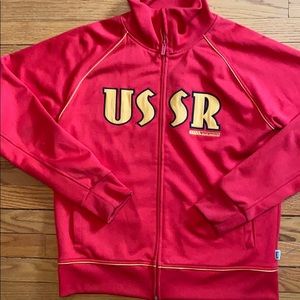 Red track jacket with yellow piping